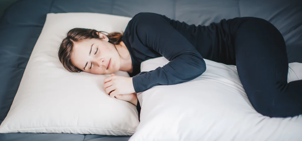 sleeping comfortably on a pillow