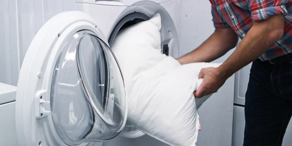 white pillow in a washer